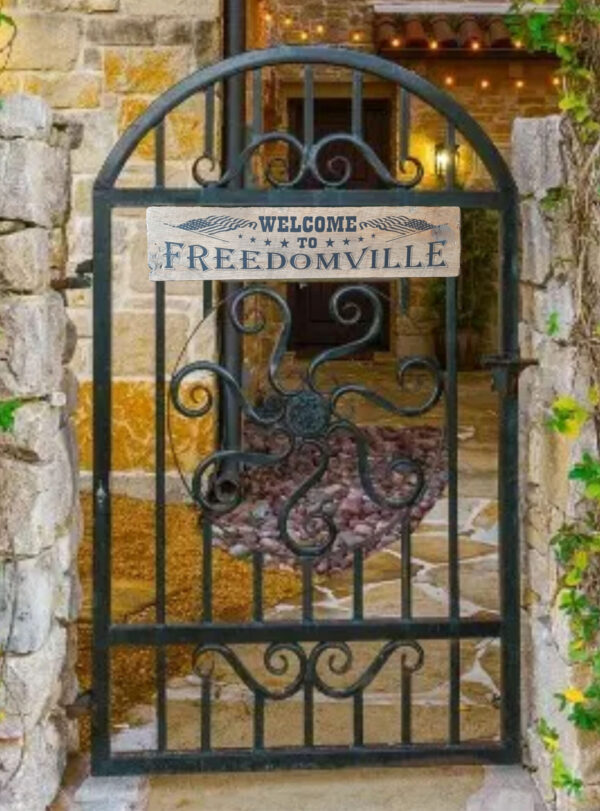 Welcome To Freedomville plaque for the home.