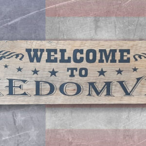 Welcome To Freedomville house plaque.