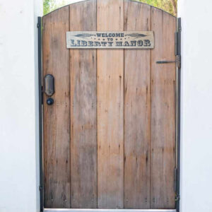 Welcome To Liberty Manor outdoor plaque for the home.