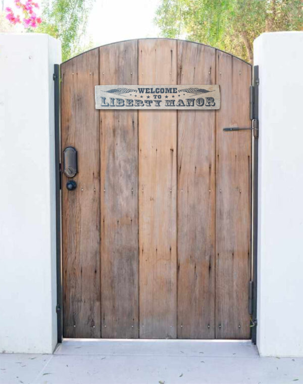 Welcome To Liberty Manor outdoor plaque for the home.