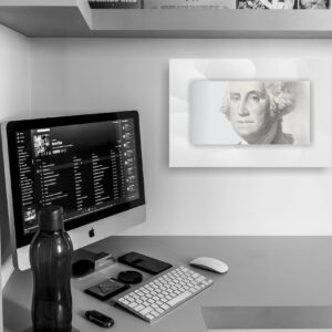 Home office scene with George Washington portrait.